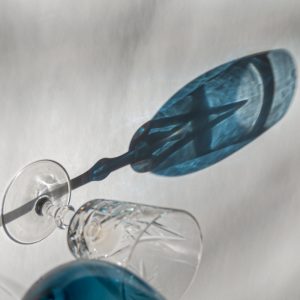 Each photograph captures the fluid dance of light, shadow, and color, inviting viewers to experience the transformative power of light in everyday objects.